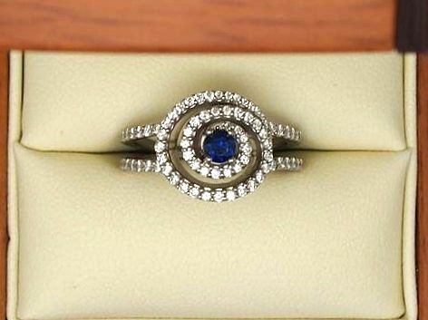 Unique sapphire and diamond engagement ring
