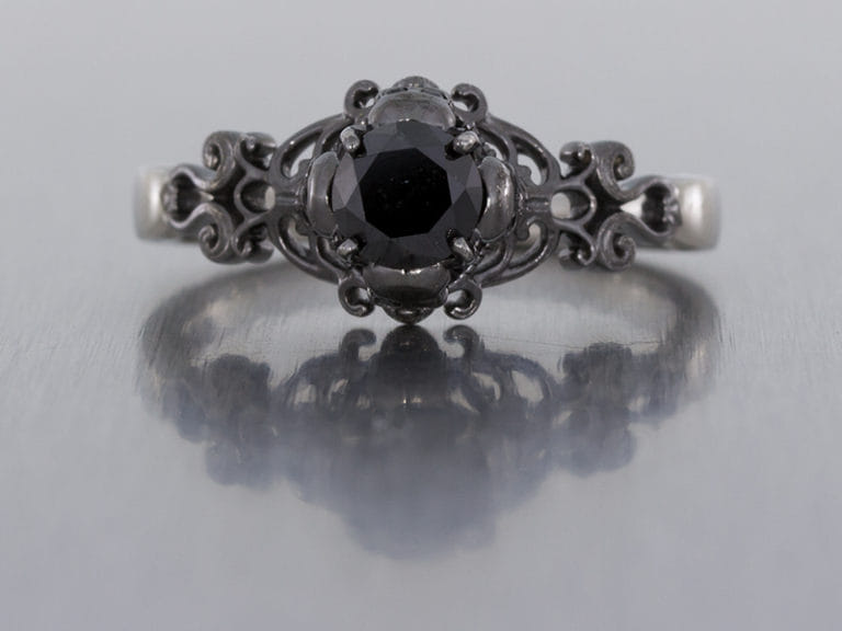 Gothic style ring set with black diamonds with scroll work and skull ...