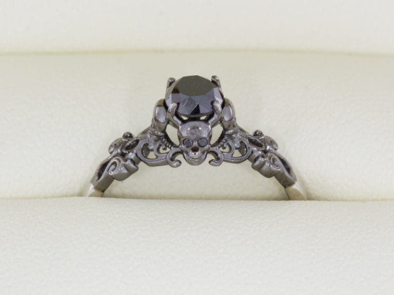 Gothic style ring set with black diamonds with scroll work and skull ...