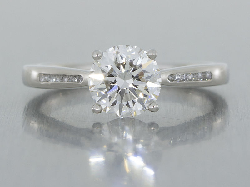 Platinum solitaire engagement ring set with a round brilliant diamond ...