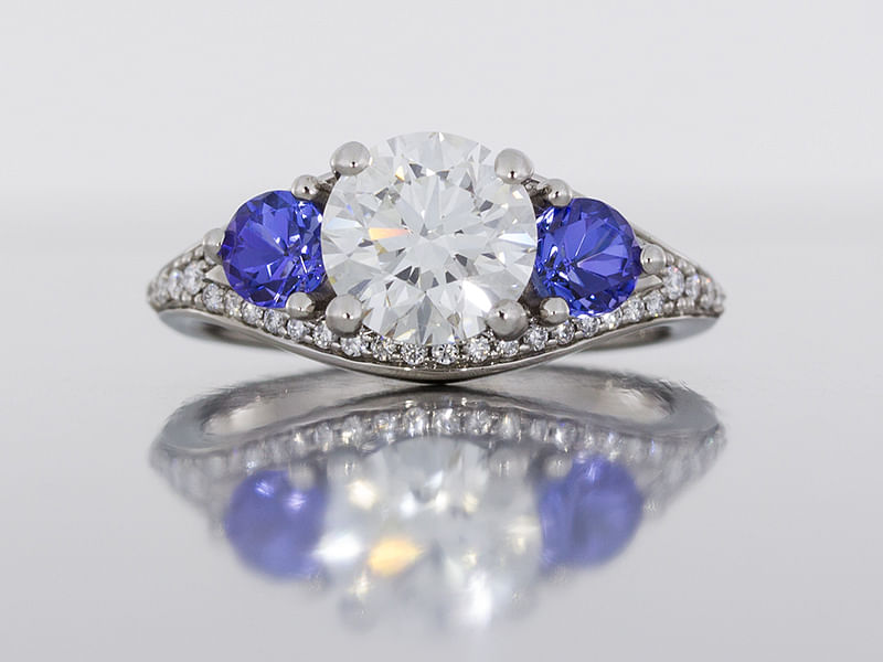 durham rose platinum engagement and wedding ring set with diamonds and tanzanites front