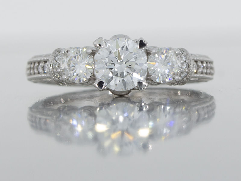 durham rose 18K white three stone diamond ring with grain set shoulders main